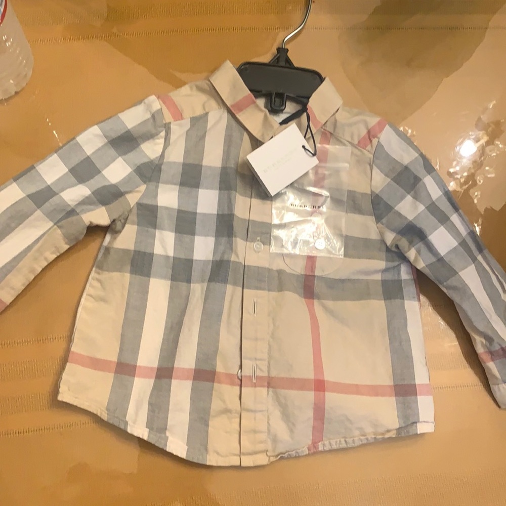 Unisex , one time used shirt fancy with org tags